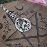 Wolf pendant surrounded by an ouroboros and a stone, pagan jewelry