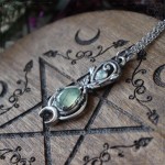 Elven infinity symbol pendant adorned with oak leaves and a prehnite