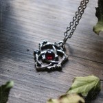 Triquetra pendant with red garnet, celtic jewelry, trinity knot