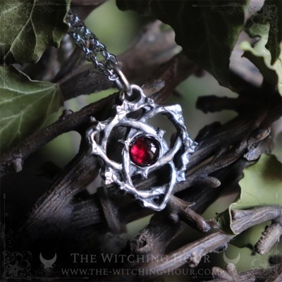 Triquetra pendant with red garnet, celtic jewelry, trinity knot