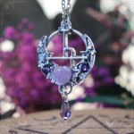 Sigil of Lilith necklace with purple rose and crystals on a moon crescent, gothic jewelry