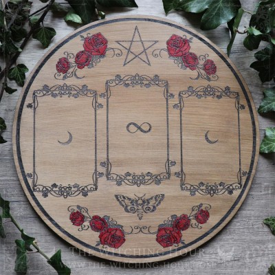 Wooden divination board decorated with red roses and a pentacle, for three-card tarot or oracle readings.