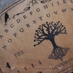 Wooden Ouija board decorated with a tree of life and crows, handcrafted, Gothic decoration, cabinet of curiosities