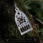 Inverted pentagram necklace in a gothic cathedral arch, gothic jewelry