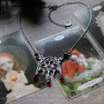 Gothic cathedral necklace with black spinel beads and red crystal drops