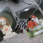 Gothic cathedral necklace with black spinel beads and red crystal drops