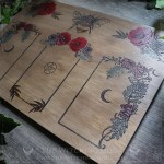 Nature inspired tarot and oracle spread board with a bumblebee, poppies and flowers