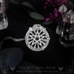 Gothic pentagram pendant on a cathedral rose window, vampire goth handmade jewelry