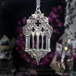 Gothic cathedral necklace surrounded by two gargoyles amd ivy leaves, vampire goth jewelry