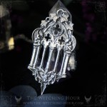 Gothic cathedral necklace surrounded by two gargoyles amd ivy leaves, vampire goth jewelry
