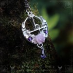 Lilith sigil necklace with a rose on a moon crescent, handmade mystical jewelry inspired by occultism