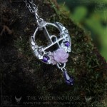 Lilith sigil necklace with a rose on a moon crescent, handmade mystical jewelry inspired by occultism