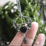 Lilith sigil necklace with a rose on a moon crescent, handmade mystical jewelry inspired by occultism