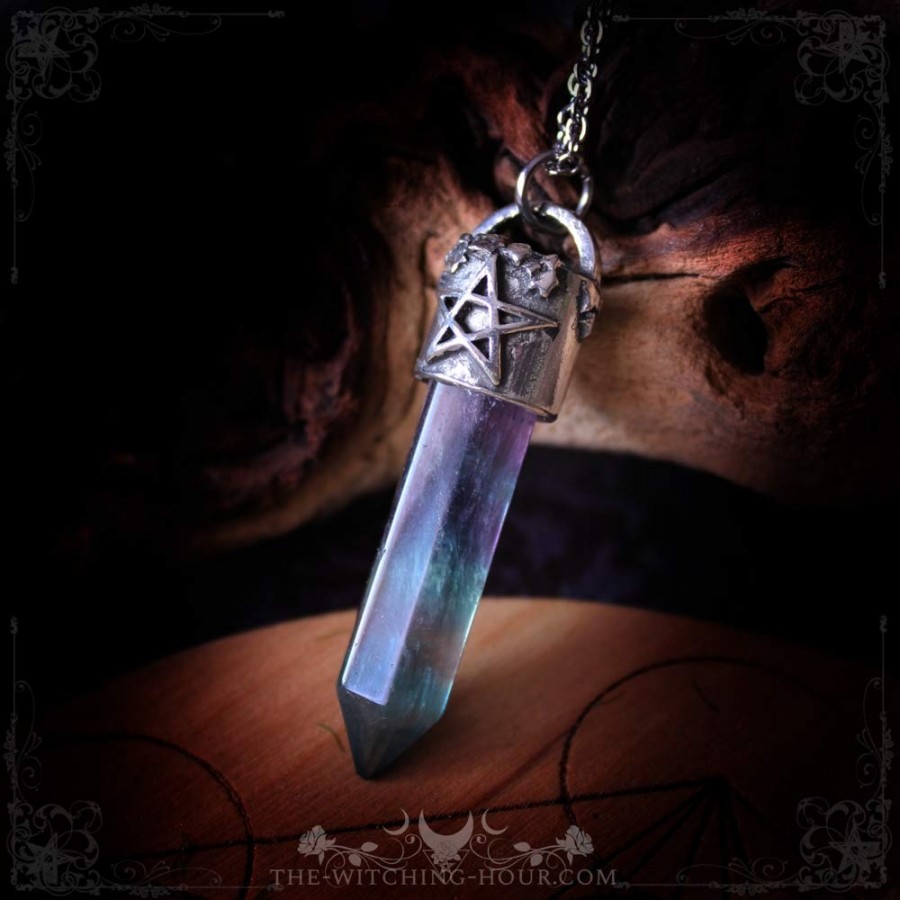 Fluorite point pendant with pentagram support