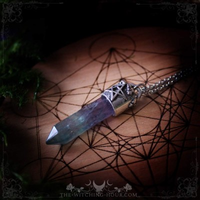 Fluorite point pendant with pentagram support