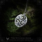 Triskel pendant in a circle, adorned with triquetra and small crystals, celtic and irish jewelry